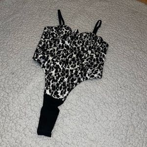 Leopard print bodysuit top! Never worn. Tags attached!